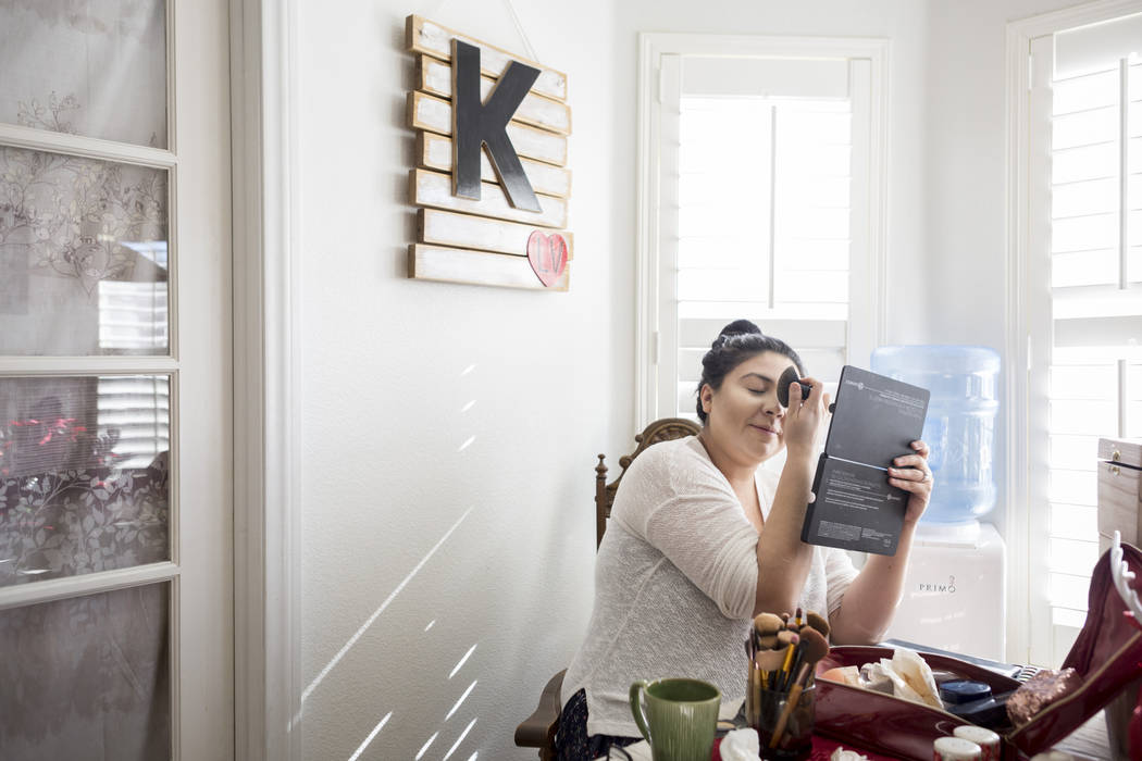 Kimberly Calderon gets ready for the day in her home in Las Vegas, Wednesday, Dec. 13, 2017. Elizabeth Brumley Las Vegas Review-Journal  @EliPagePhoto