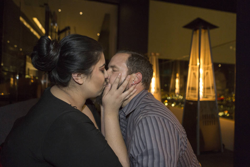 Kimberly Calderon, left, and William King, celebrate after King proposed and she accepted at the Delano Las Vegas hotel-casino in Las Vegas. Saturday, Dec. 9, 2017. Elizabeth Brumley Las Vegas Rev ...