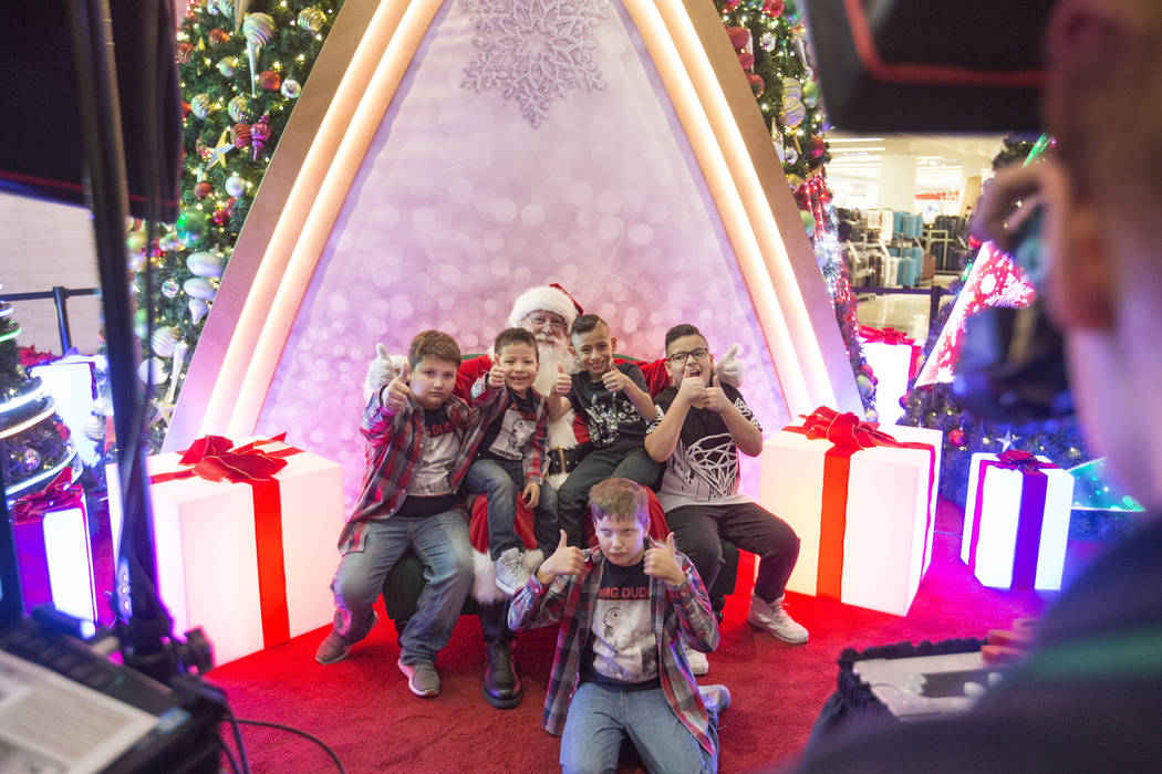 The King family and their cousins take a photo with Santa as a family tradition, at the Fashion Show mall in Las Vegas, Wednesday, Dec. 6, 2017. Elizabeth Brumley Las Vegas Review-Journal  @EliPag ...