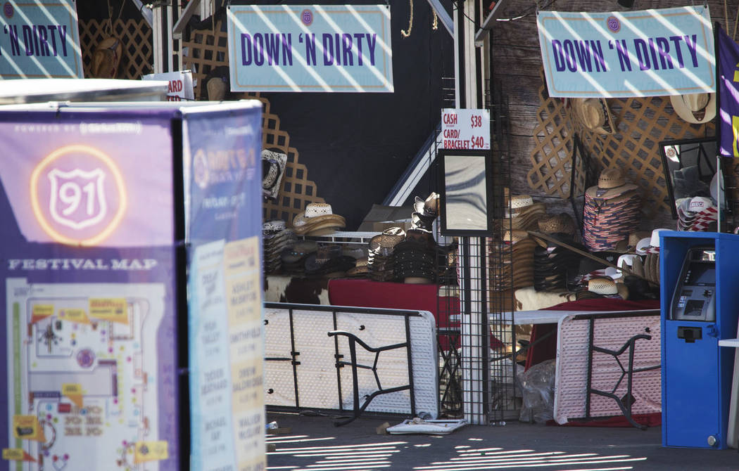 The Down N Dirty Hat Company booth sits frozen in time at the Route 91 Harvest shooting site at Las Vegas Village festival grounds, Tuesday, Oct. 31, 2017. Richard Brian Las Vegas Review-Journal @ ...