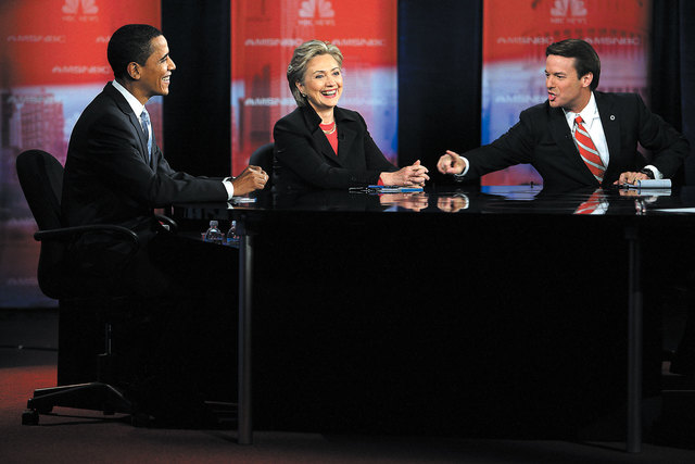 Democratic presidential candidates, Sen. Barack Obama, left, Sen. Hillary Clinton and former Sen. John Edwards share a laugh during the Democratic presidential candidates debate at Cashman Center  ...