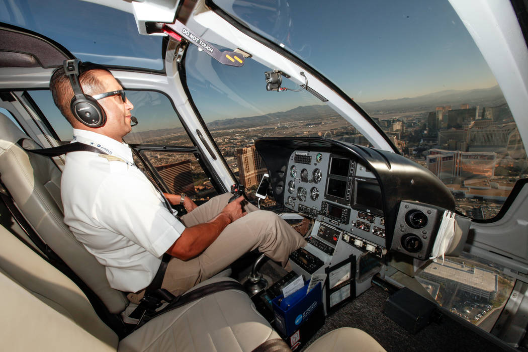Maverick Helicopters Pilot Joe Munoz, 41, flies near the Strip in Las Vegas, Friday, Dec. 1, 2017. Joel Angel Juarez Las Vegas Review-Journal @jajuarezphoto