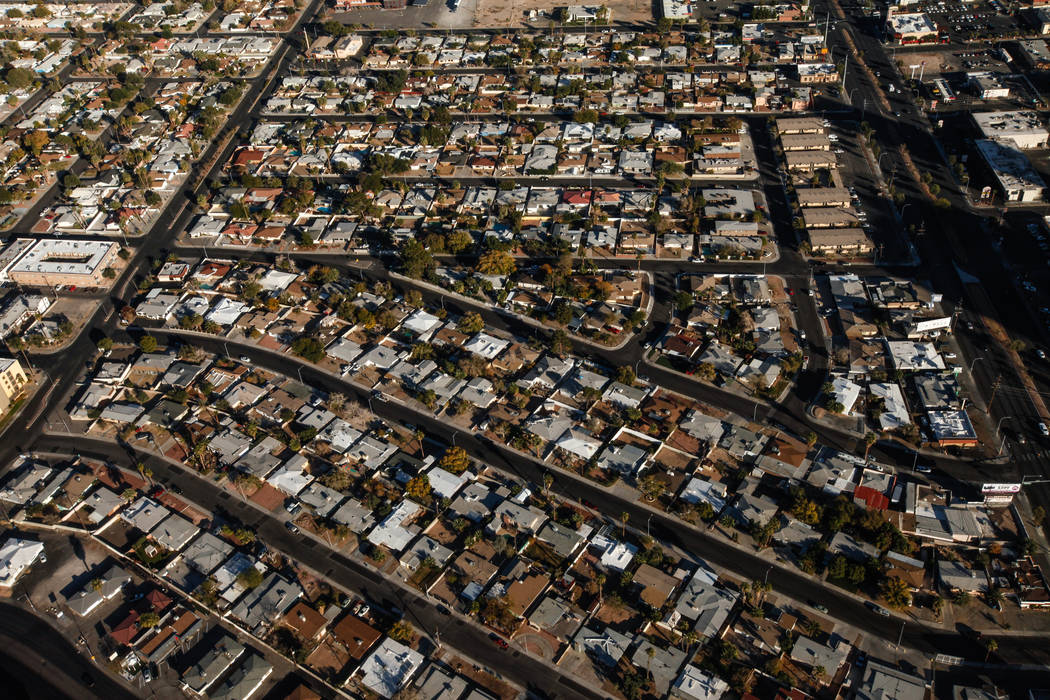 A view of residential homes as seen from inside a helicopter piloted by Joe Munoz, 41, of Maverick Helicopters, in Las Vegas, Friday, Dec. 1, 2017. Joel Angel Juarez Las Vegas Review-Journal @jaju ...