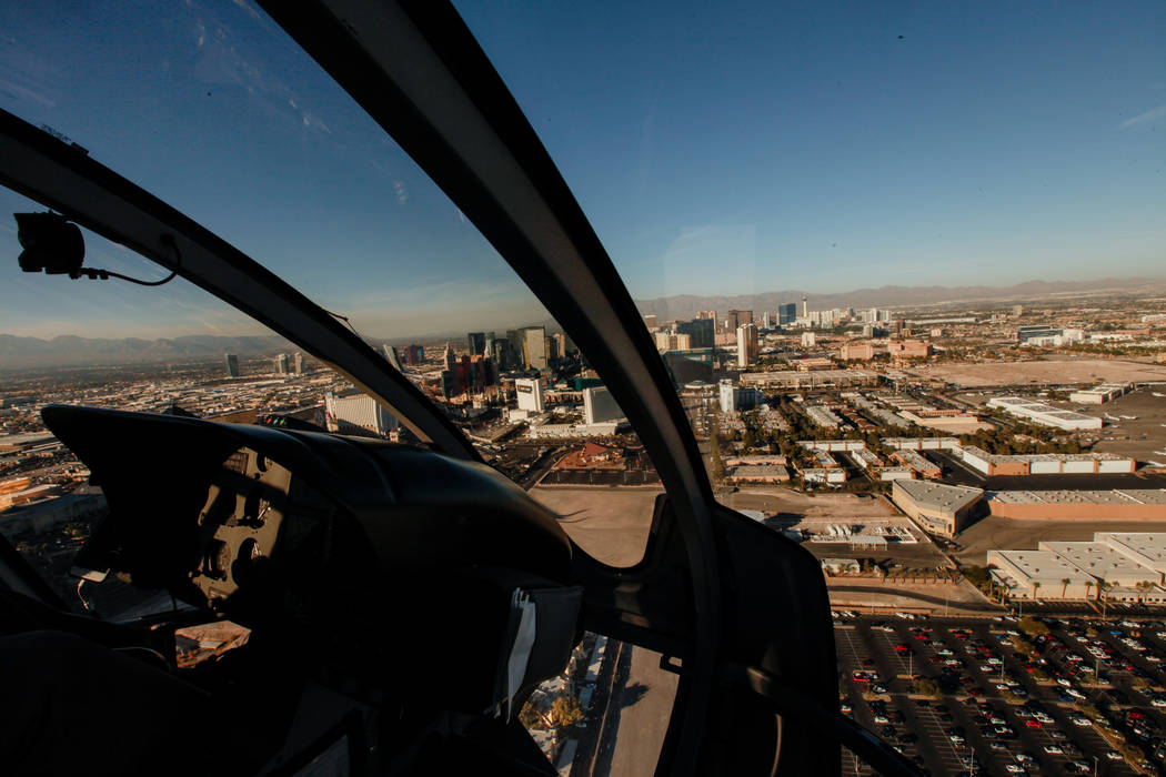 A view of Las Vegas as seen from inside a helicopter piloted by Joe Munoz, 41, of Maverick Helicopters, Friday, Dec. 1, 2017. Joel Angel Juarez Las Vegas Review-Journal @jajuarezphoto