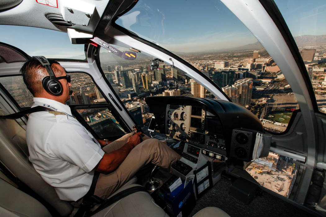 Maverick Helicopters Pilot Joe Munoz, 41, flies near the Strip in Las Vegas, Friday, Dec. 1, 2017. Joel Angel Juarez Las Vegas Review-Journal @jajuarezphoto