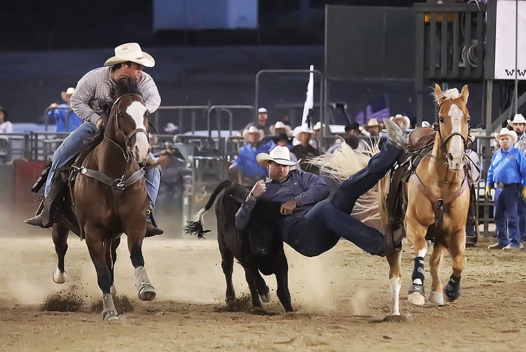 Former NFL tight end Bear Pascoe, shown wrestling a steer in San Bernardino, California, is trying to make the transition from the Super Bowl to the National Finals Rodeo. (Photo by Gene Hyder)