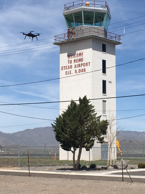 A drone flies near the Reno-Stead airport tower during an air traffic exercise April 19. Chris Walach