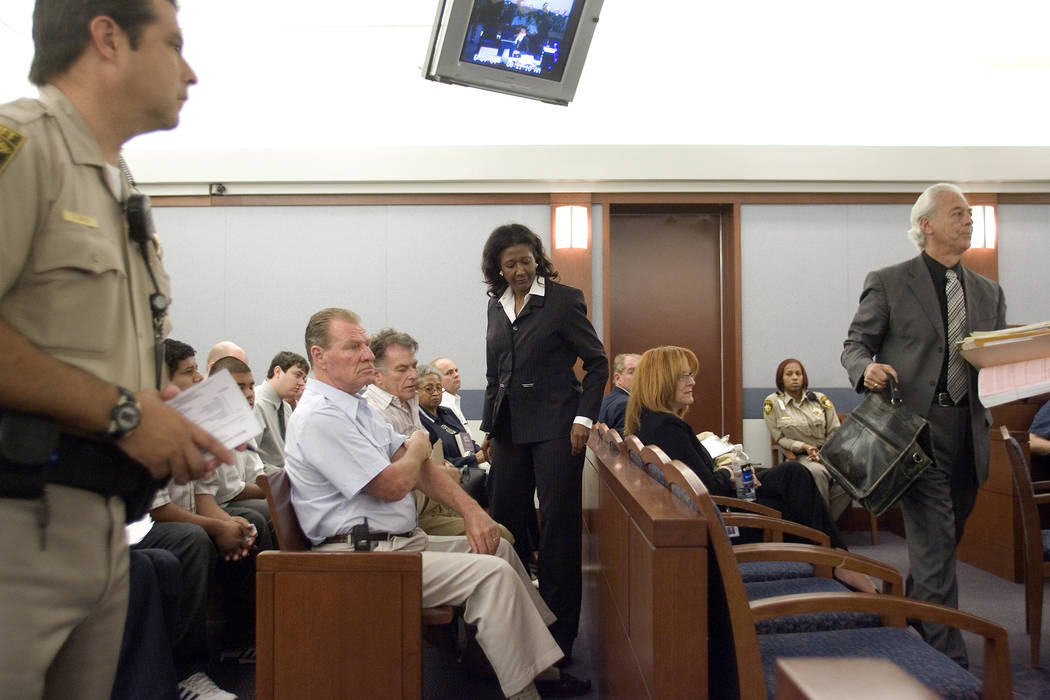 Former county commissioner Lynette Boggs, center, with attorney Bill Terry, right, appear in Las Vegas Justice Court, Thursday morning, June 7, 2007.  Boggs appeared in court to face felony charge ...