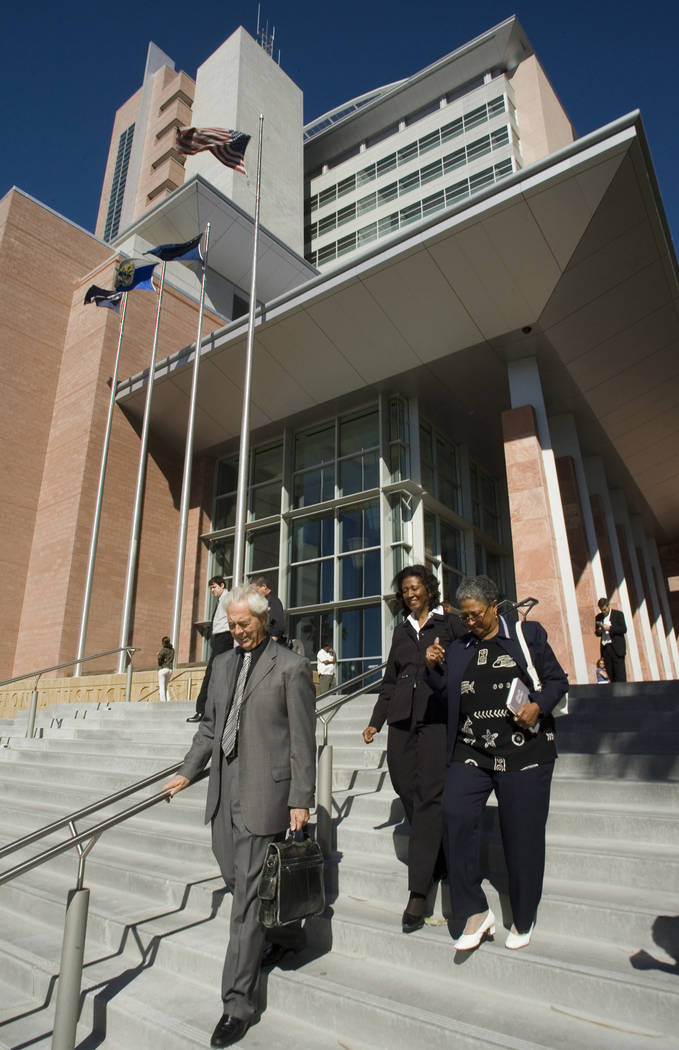 Former county commissioner Lynette Boggs leaves the Regional Justice Center with her attorney, Bill Terry, left, and an unidentifed woman, after appearing in Las Vegas Justice Court, Thursday morn ...