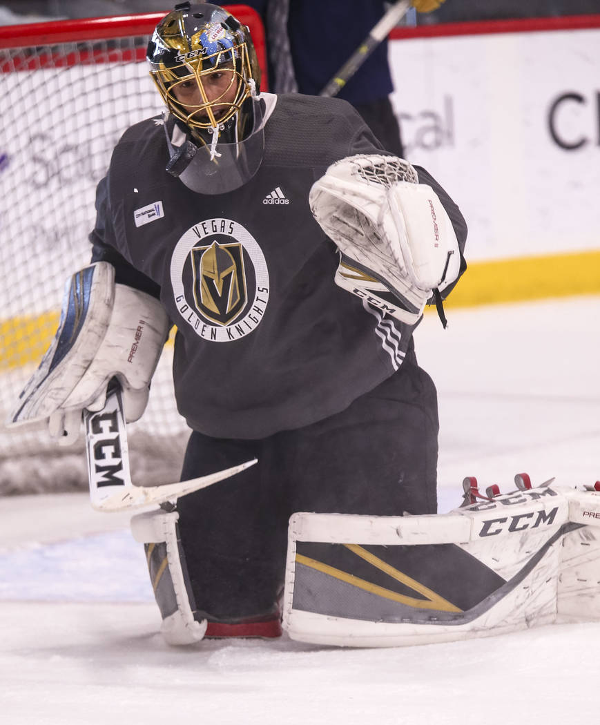 Vegas Golden Knights goalie Marc-Andre Fleury catches the puck during the NHL team's practice at the City National Arena in Las Vegas, Wednesday, Dec. 6, 2017. Richard Brian Las Vegas Review-Journ ...