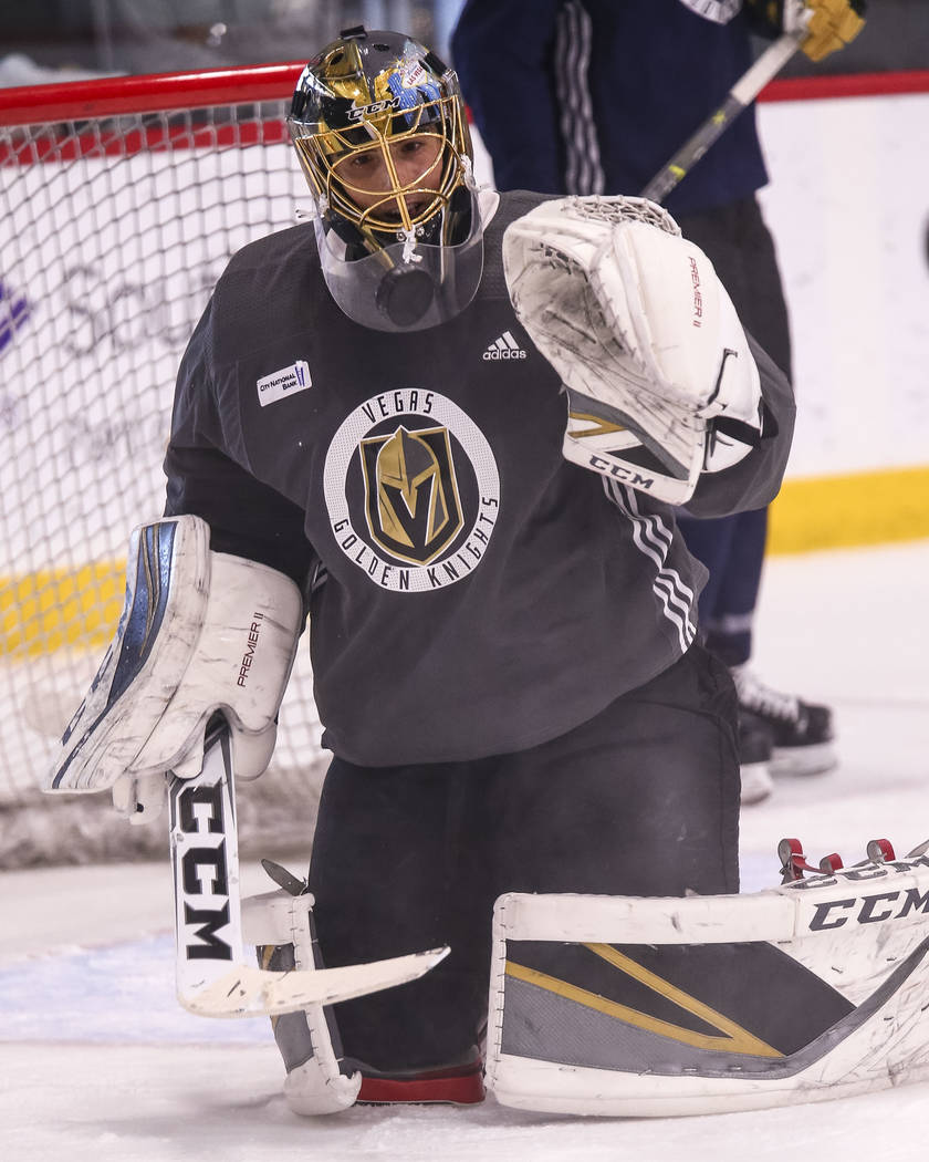 Vegas Golden Knights goalie Marc-Andre Fleury catches the puck during the NHL team's practice at the City National Arena in Las Vegas, Wednesday, Dec. 6, 2017. Richard Brian Las Vegas Review-Journ ...