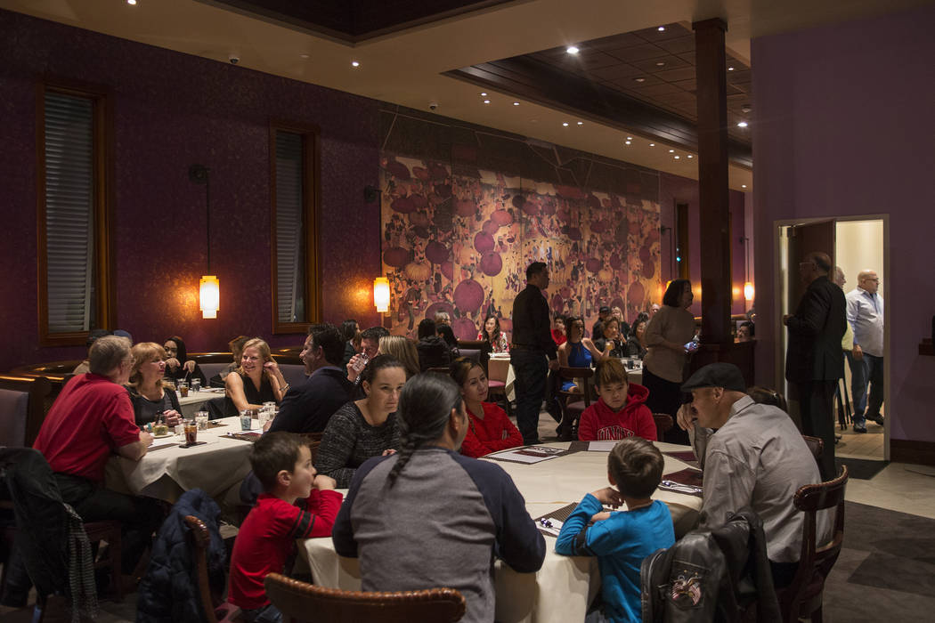 Guests eat in the dinning room at the new second location of Lotus of Siam, a thai restaurant, in Las Vegas, Sunday, Dec. 10, 2017. The restaurant held a birthday party for Chef Saipin Chutima tha ...