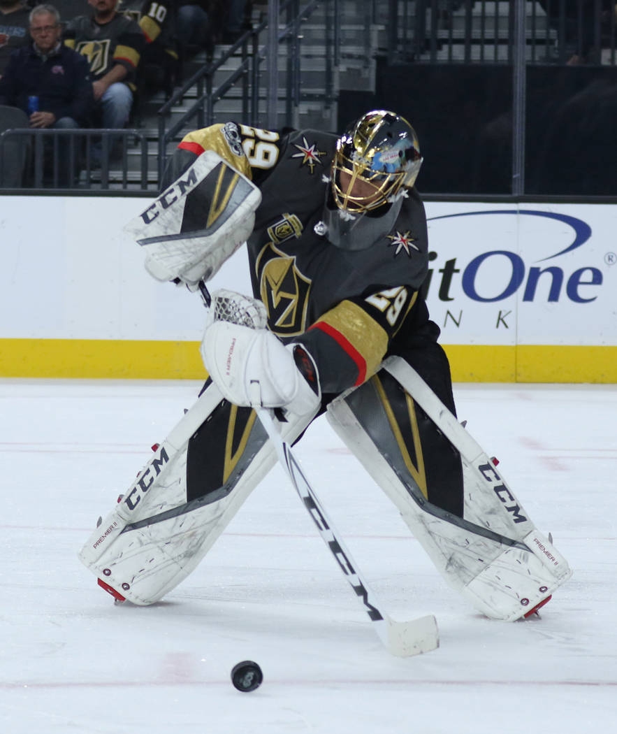 Vegas Golden Knights goalie Marc-Andre Fleury (29) handles the puck during the first period of a NHL game against the Carolina Hurricanes in Las Vegas, Tuesday, Dec. 12, 2017. Heidi Fang Las Vegas ...