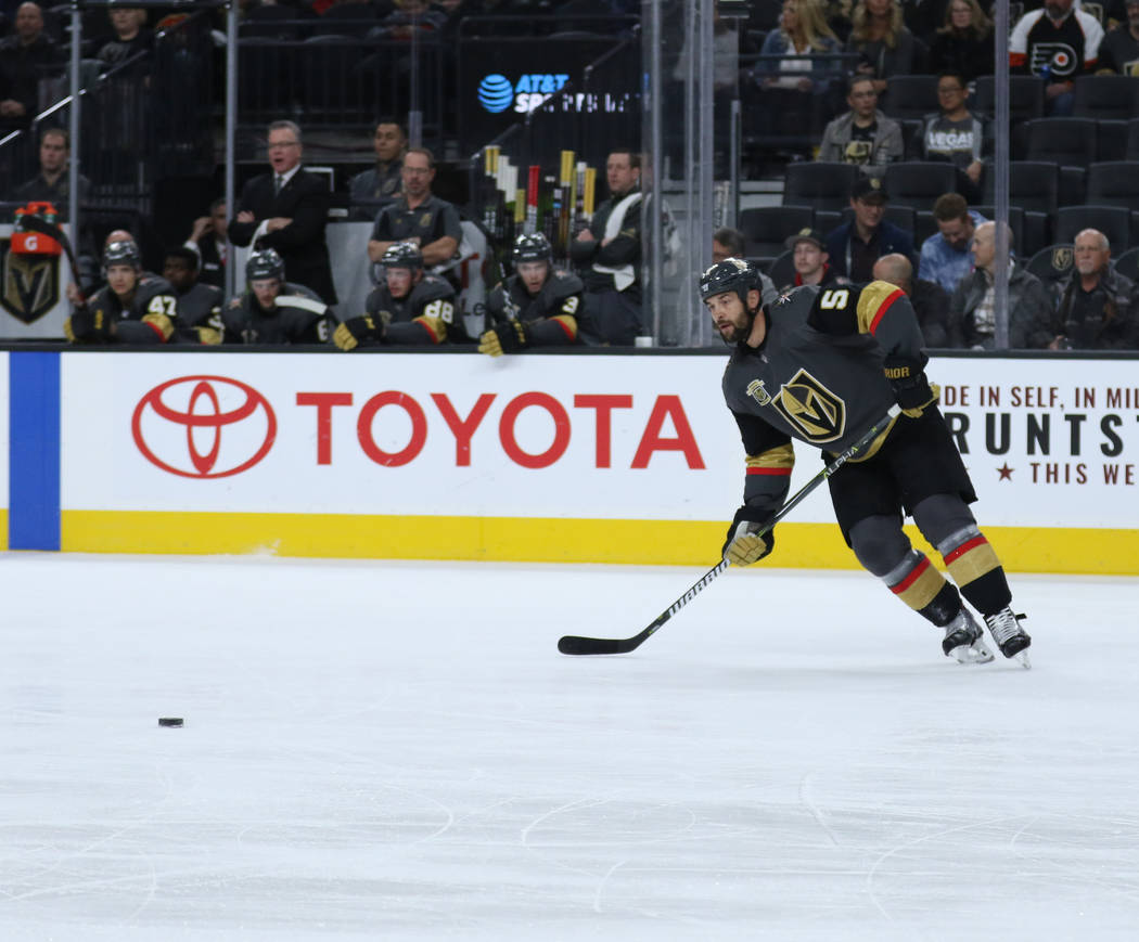 Vegas Golden Knights defenseman Deryk Engelland (5) handles the puck during the first period of a NHL game against the Carolina Hurricanes in Las Vegas, Tuesday, Dec. 12, 2017. Heidi Fang Las Vega ...