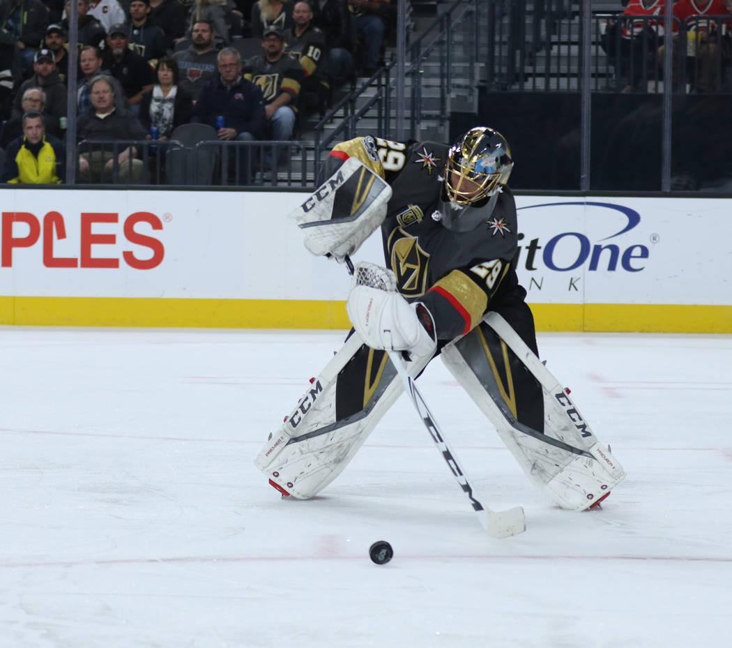 Vegas Golden Knights goalie Marc-Andre Fleury (29) handles the puck during the first period of a NHL game against the Carolina Hurricanes in Las Vegas, Tuesday, Dec. 12, 2017. Heidi Fang Las Vegas ...
