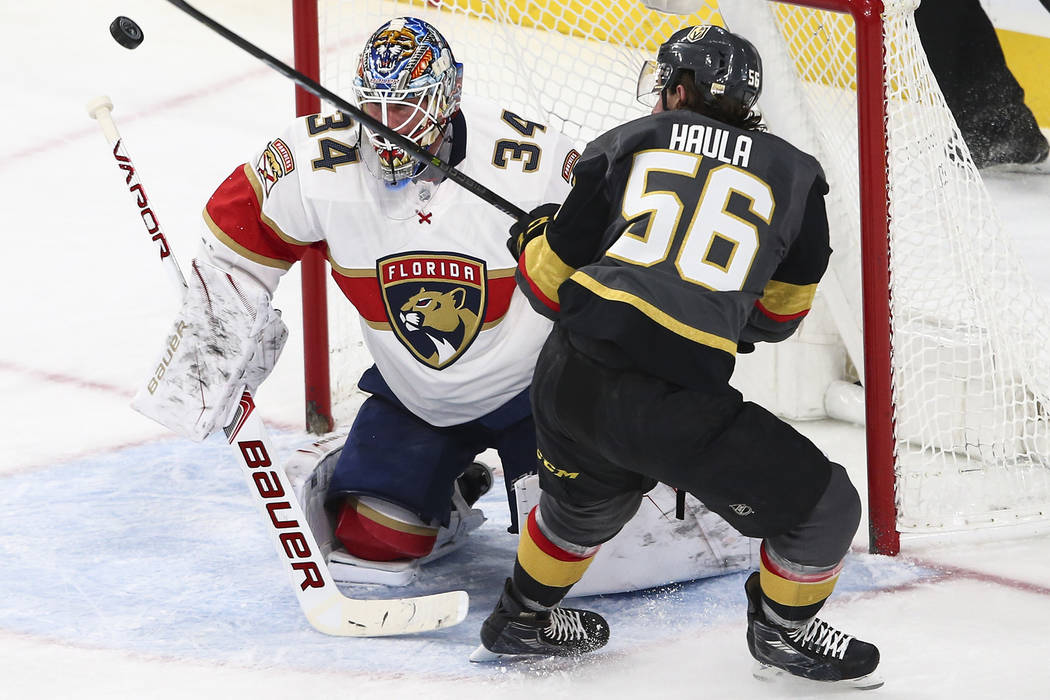 Golden Knights' Erik Haula (56) tries to score on Florida Panthers goalie James Reimer (34) during an NHL hockey game at T-Mobile Arena in Las Vegas on Sunday, Dec. 17, 2017. Chase Stevens Las Veg ...