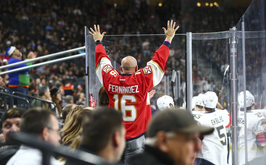 A Florida Panthers fan celebrates a goal against the Golden Knights during an NHL hockey game at T-Mobile Arena in Las Vegas on Sunday, Dec. 17, 2017. Chase Stevens Las Vegas Review-Journal @csste ...