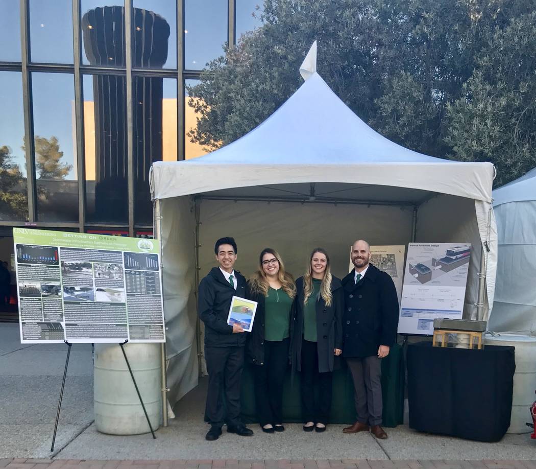 From left to right: Jason Shon, Jennifer Jarquin, Autumn Donovan and Miles Buckner present their project titled "Betting on Green: Infrastructure Redesign for the Future of Las Vegas" at the annua ...