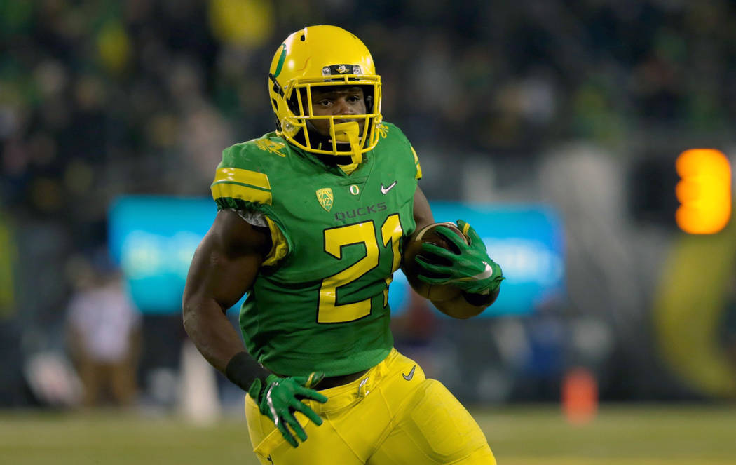 Nov 18, 2017; Eugene, OR, USA; Oregon Ducks running back Royce Freeman (21) runs the ball in the fourth quarter against the Arizona Wildcats at Autzen Stadium. Mandatory Credit: Scott Olmos-USA TO ...