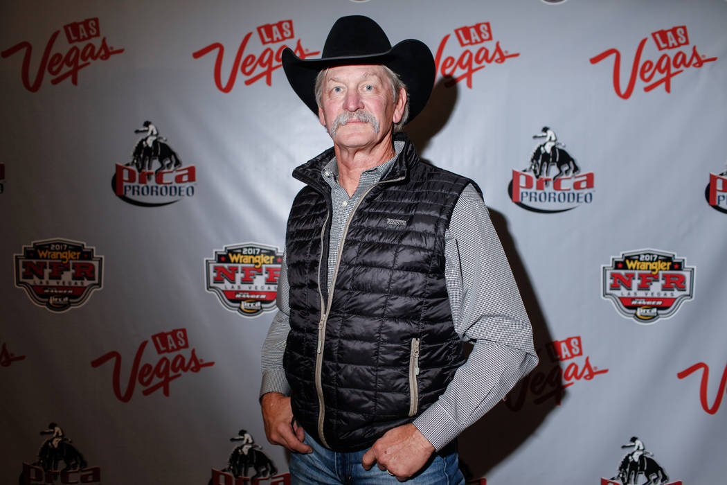 Karl Stressman, commissioner of the Professional Rodeo Cowboy Association, of Tucson, Ariz., 67, poses for a portrait at the end of the third night of the 59th Wrangler National Finals Rodeo at th ...