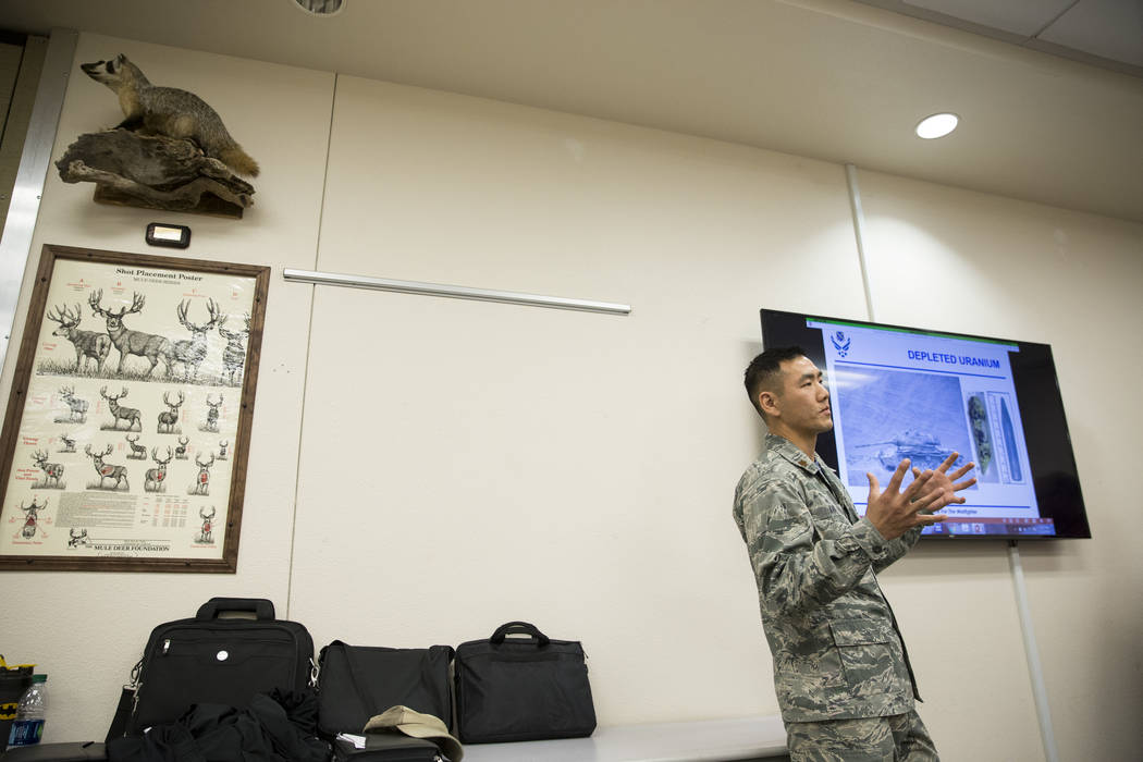 U.S. Air Force Maj. Michael Kan gives instructions during an orientation at the Clark County Shooting Complex for hunters randomly picked for the annual bighorn sheep hunt inside the Nevada Test a ...