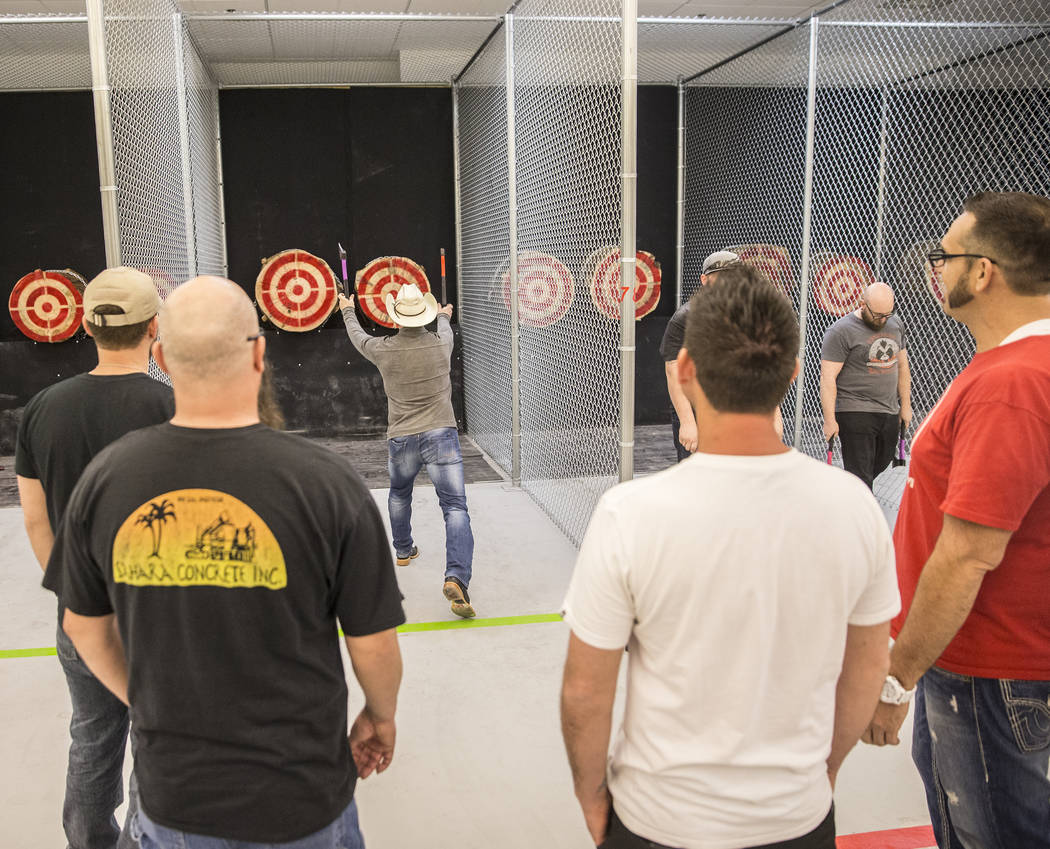 Jared Lowry practices throwing axes at Axe Monkeys Vegas on Wednesday, Feb. 1, 2017, in Las Vegas. The new business is slated to open in late February, offering customers the ability to throw axes ...
