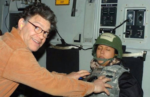 Minnesota Sen. Al Franken appears to place his hands on model and radio host Leeann Tweeden's breasts in this photo released by Tweeden. Tweeden posted the photo on the website of KABC, where she ...