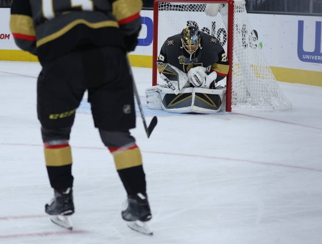 Vegas Golden Knights goalie Marc-Andre Fleury (29) attempts to make a save during the first period of a NHL game against the Carolina Hurricanes in Las Vegas, Tuesday, Dec. 12, 2017. Heidi Fang La ...