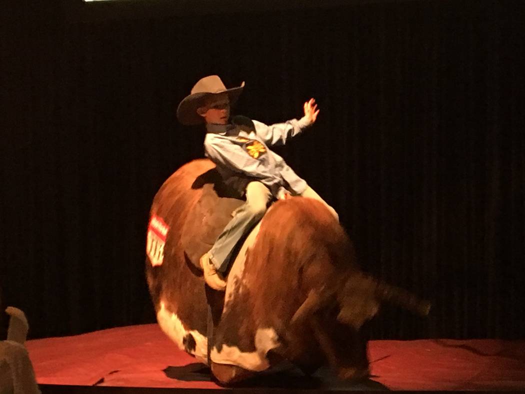 While most patrons at the Silverton's Veil Pavilion took in the Wrangler NFR viewing party, this young cowboy tested his mettle on the mechanical bull. Patrick Everson/Special to the Las Vegas Rev ...