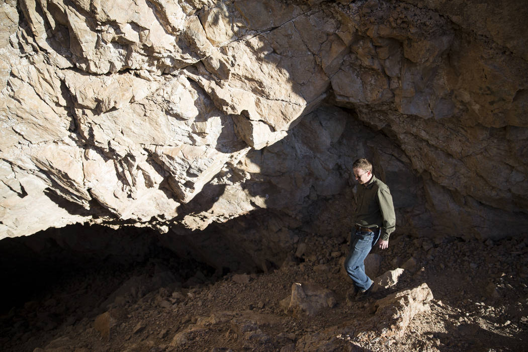 Archaeologist Justin DeMaio descents into the Gypsum Cave in Las Vegas, Tuesday, Dec. 19, 2017. (Erik Verduzco/Las Vegas Review-Journal)