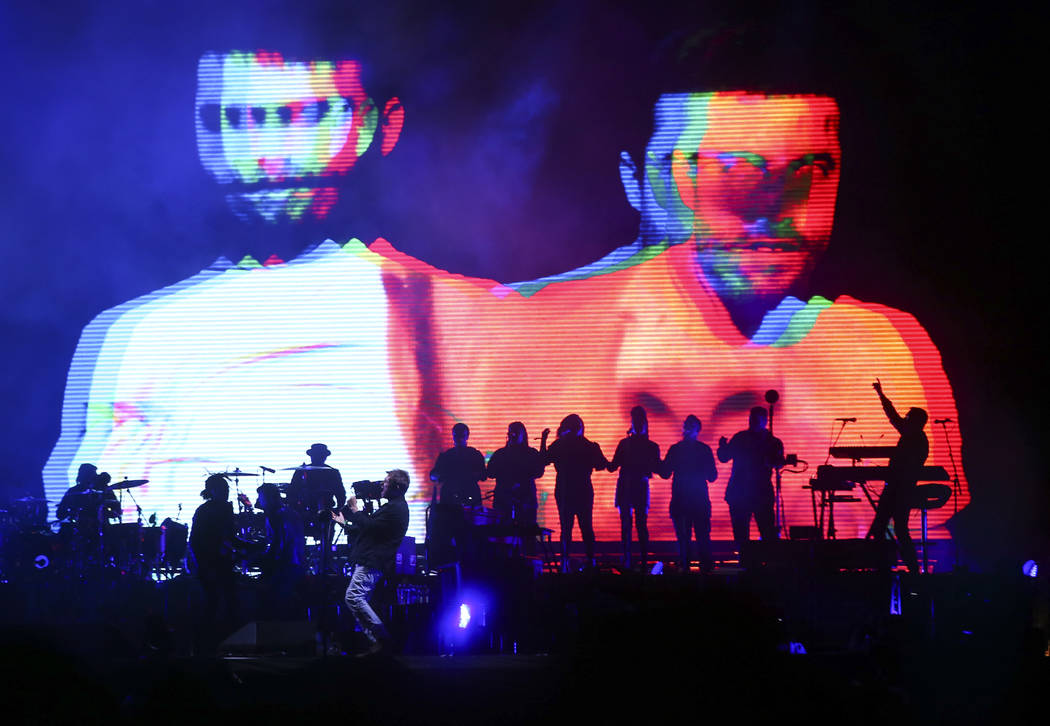 Damon Albarn of Gorillaz, lower left, performs at the Downtown stage during the final day of the Life is Beautiful festival in downtown Las Vegas on Sunday, Sept. 24, 2017. Chase Stevens Las Vegas ...