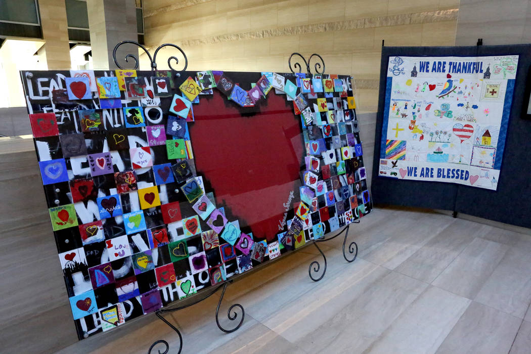 An art piece, left, created through a partnership with Gracieճ House and New Vista Art Project is on exhibit on the second floor of Las Vegas City Hall as part of the Hearts for Vegas projec ...