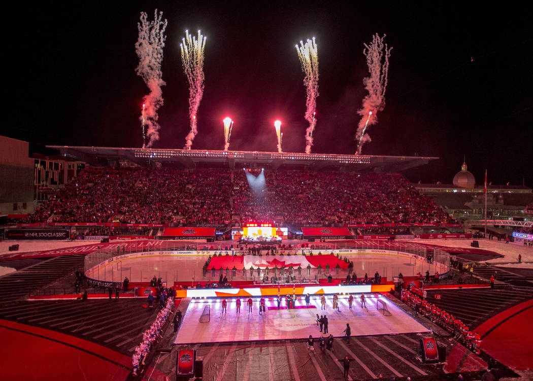 Fireworks go off during the ceremonies before hockey action between the Ottawa Senators and Montreal Canadiens at the NHL 100 Classic, in Ottawa on Saturday, Dec. 16, 2017. (Sean Kilpatrick/The Ca ...
