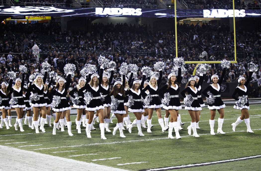 The Raiderettes make their way onto the field ahead of the Oakland Raiders game against the Dallas Cowboys in Oakland, Calif., Sunday, Dec. 17, 2017. Heidi Fang Las Vegas Review-Journal @HeidiFang