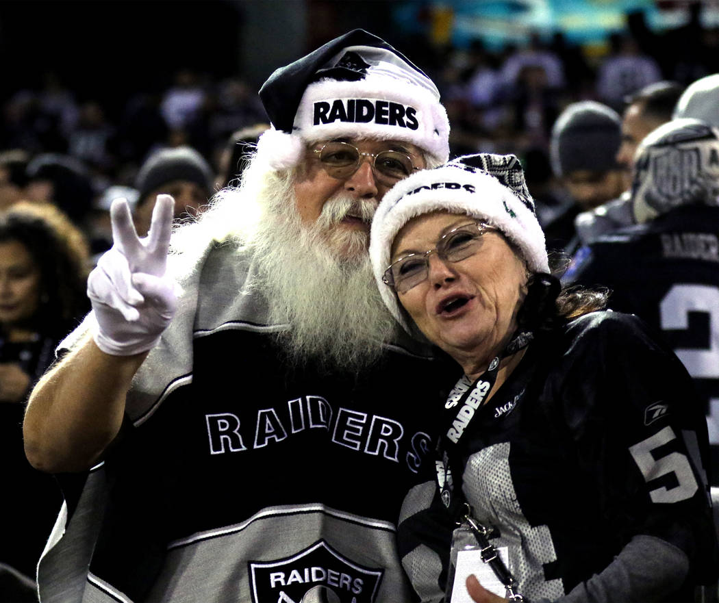 An Oakland Raiders fan is dressed like Santa Claus during the first half of a NFL game against the Dallas Cowboys in Oakland, Calif., Sunday, Dec. 17, 2017. Heidi Fang Las Vegas Review-Journal @He ...