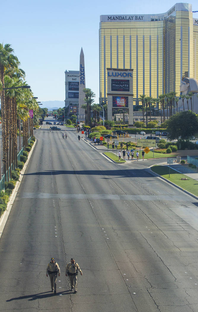 Las Vegas police keep the Strip south of Tropicana Avenue clear on Monday, October 2, 2017, in Las Vegas. A gunman in a Mandalay Bay hotel room shot into a crowd of thousands at an outdoor country ...