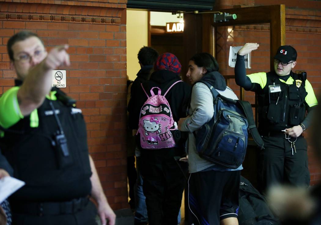 Several people who were on the Amtrak train which derailed arrive by bus on Monday, Dec. 18, 2017, in Portland, Ore. An Amtrak train making the first-ever run along a faster new route hurtled off ...