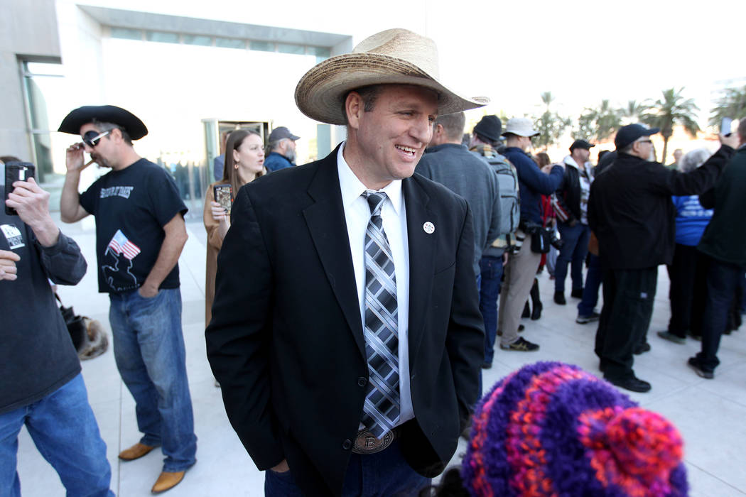 Defendant Ammon Bundy greets supporters outside the Lloyd George U.S. Courthouse on Wednesday, Dec. 20, 2017, after a mistrial was declared in the Bunkerville standoff case involving his father, r ...
