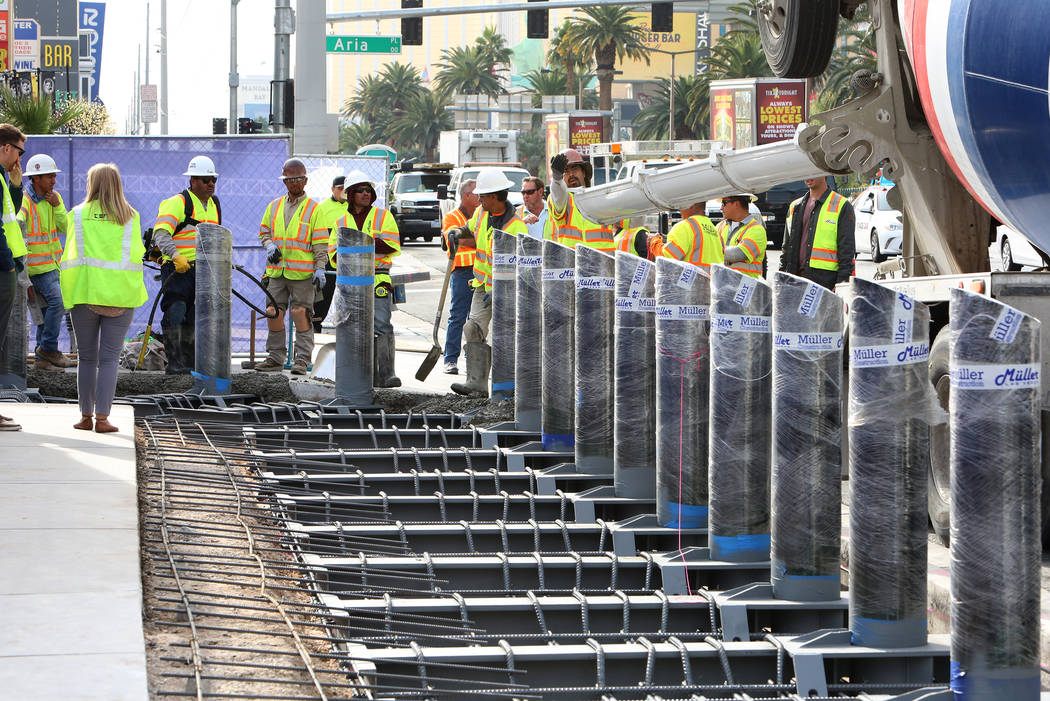 Construction crews began installing steel posts on the Strip near Aria on Monday, Nov. 13, 2017, to protect pedestrians along Las Vegas Boulevard. (Bizuayehu Tesfaye/Las Vegas Review-Journal) @biz ...