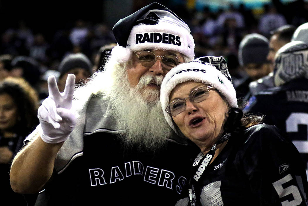 An Oakland Raiders fan is dressed like Santa Claus during the first half of a NFL game against the Dallas Cowboys in Oakland, Calif., Sunday, Dec. 17, 2017. Heidi Fang Las Vegas Review-Journal @He ...