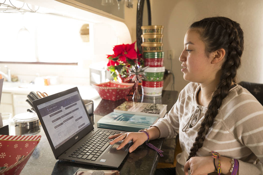 Route 91 survivor and eight-grader Francesca Trujillo, 13, logs into her Nevada Virtual Academy classroom at her Las Vegas home on Friday, Dec. 22, 2017. Richard Brian Las Vegas Review-Journal @ve ...
