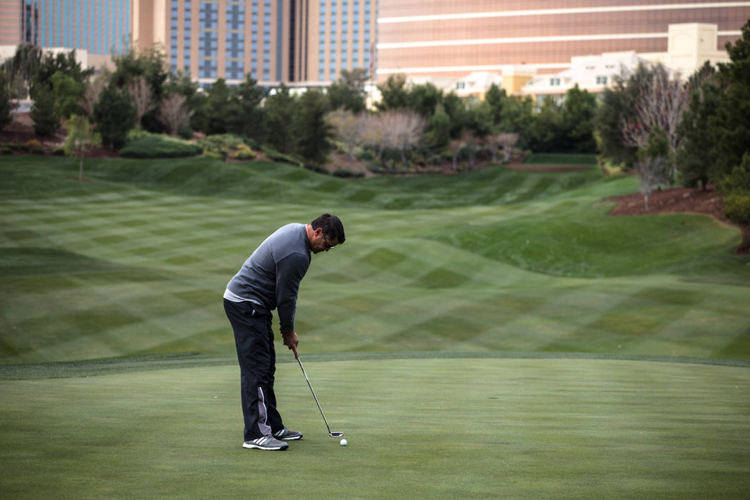 Wynn Las Vegas employee George Fonte, 50, golfs at the Wynn Country Club in Las Vegas, Friday, Dec. 22, 2017. The golf course is shutting down on Dec. 23 and will be replaced with Paradise Park, a ...
