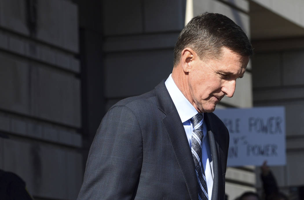 Former Trump national security adviser Michael Flynn leaves federal court in Washington, Friday, Dec. 1, 2017. Flynn pleaded guilty Friday to making false statements to the FBI, the first Trump Wh ...