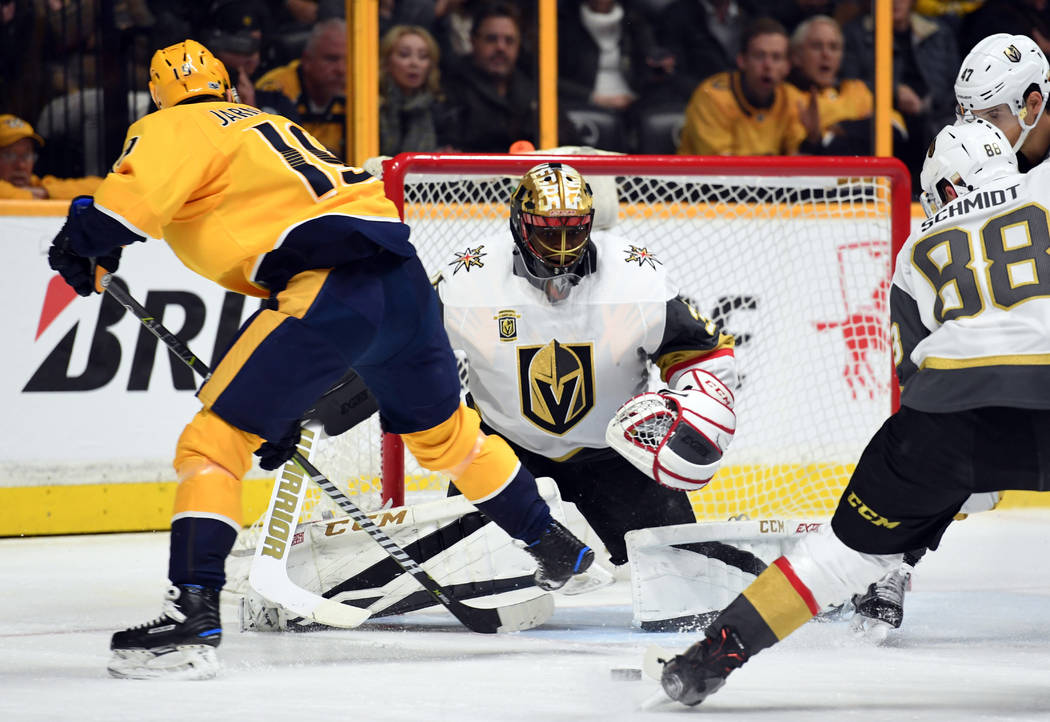 Dec 8, 2017; Nashville, TN, USA; Vegas Golden Knights goalie Malcolm Subban (30) makes a save on a shot by Nashville Predators center Calle Jarnkrok (19) during the first period at Bridgestone Are ...