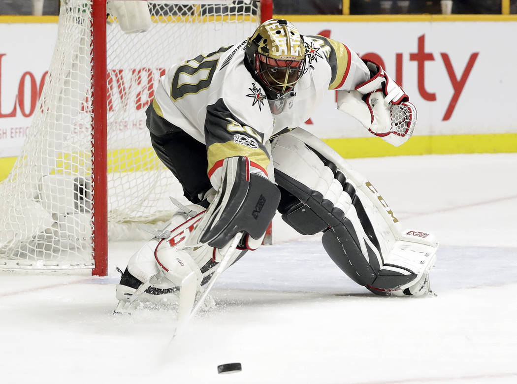 Vegas Golden Knights goalie Malcolm Subban makes a stop against the Nashville Predators during the second period of an NHL hockey game Friday, Dec. 8, 2017, in Nashville, Tenn. (AP Photo/Mark Hump ...