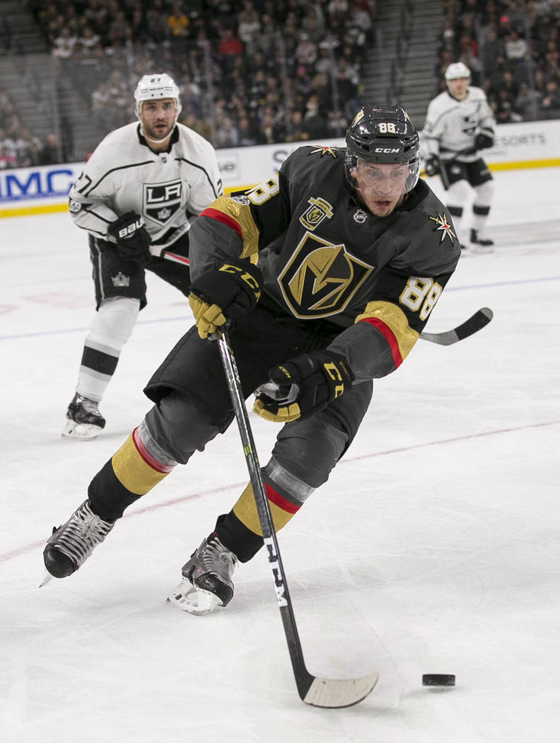 Vegas Golden Knights defenseman Nate Schmidt (88) controls the puck against the Los Angeles Kings during the third period of an NHL hockey game at the T-Mobile Arena in Las Vegas on Sunday, Nov. 1 ...