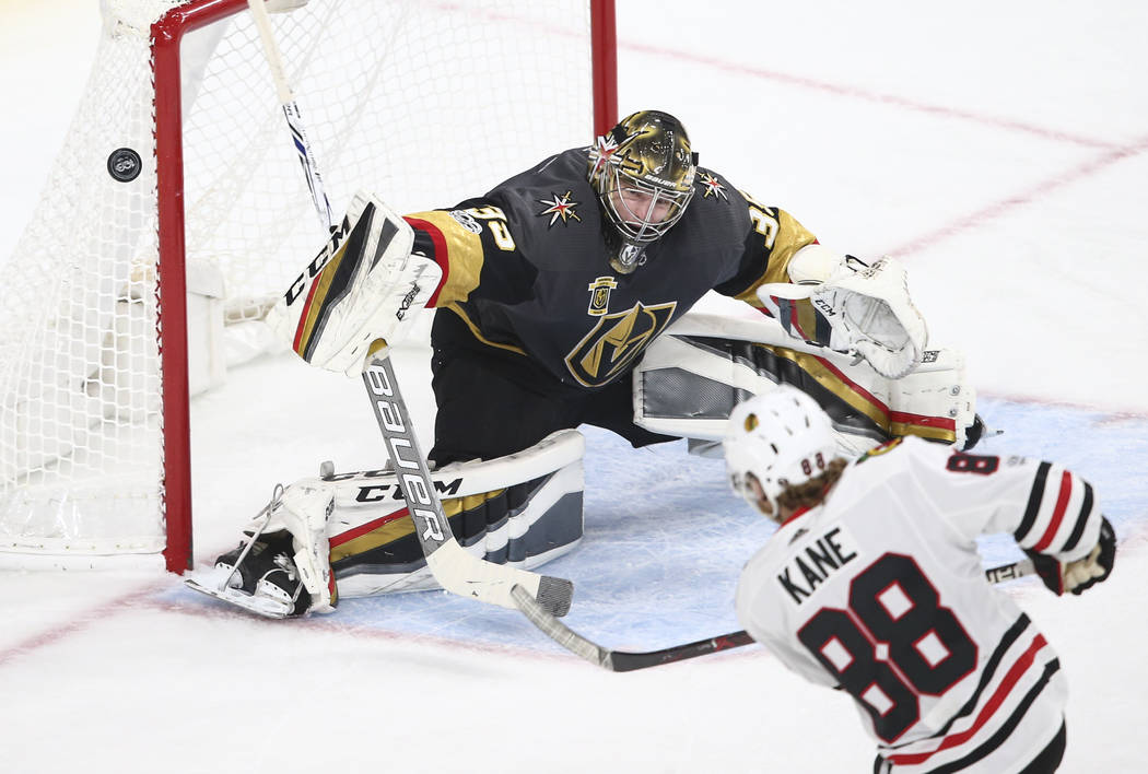 Golden Knights' goalie Oscar Dansk (35) blocks a shot from the Chicago Blackhawks during an NHL hockey game at T-Mobile Arena in Las Vegas on Tuesday, Oct. 24, 2017. Chase Stevens Las Vegas Review ...