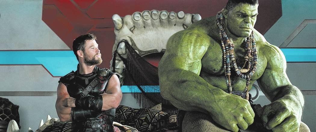This image released by Marvel Studios shows Chris Hemsworth, left, and the Hulk in a scene from, &quot;Thor: Ragnarok.&quot; (Marvel Studios via AP)