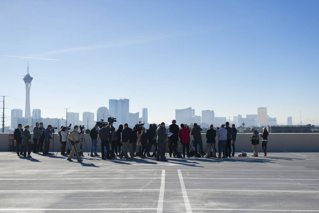 Members of the news media gather at Metropolitan Police Department Headquarters in Las Vegas Wednesday, Dec. 27, 2017, for a press conference about security for the upcoming New Year's Eve celebra ...