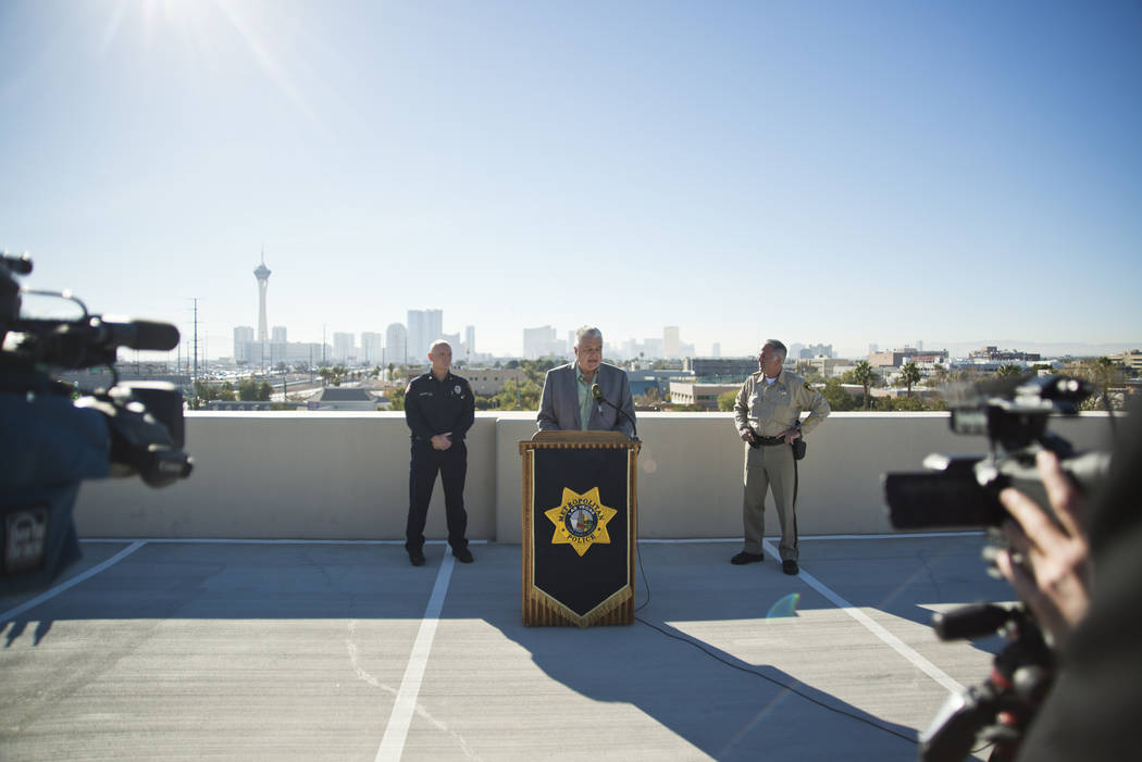 Clark County officials, from left, Fire Chief Greg Cassell, Commissioner Steve Sisolak, and Sheriff Joe Lombardo talk about New Year's Eve security during a news conference at Metropolitan Police  ...